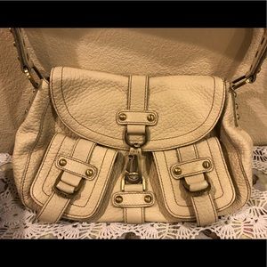 Rafe cream colored leather shoulder bag.